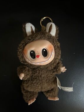 Brown Plush Monster Keychain with Cute Face